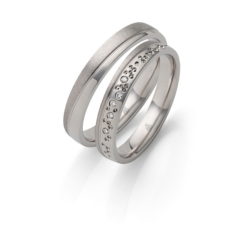 Speelse trouwringen - Unieke trouwringenset witgoud - Rauschmayer - Diamant