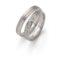 Speelse trouwringen - Unieke trouwringenset witgoud - Rauschmayer - Diamant